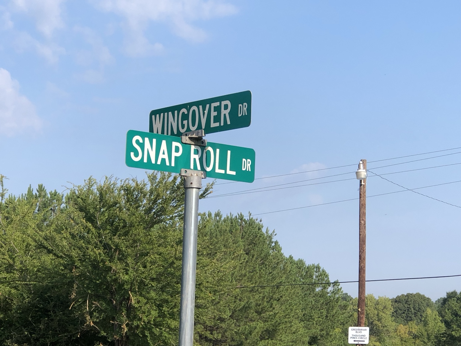 Wingover Drive and Snap Roll Drive street signs at Aero Estates