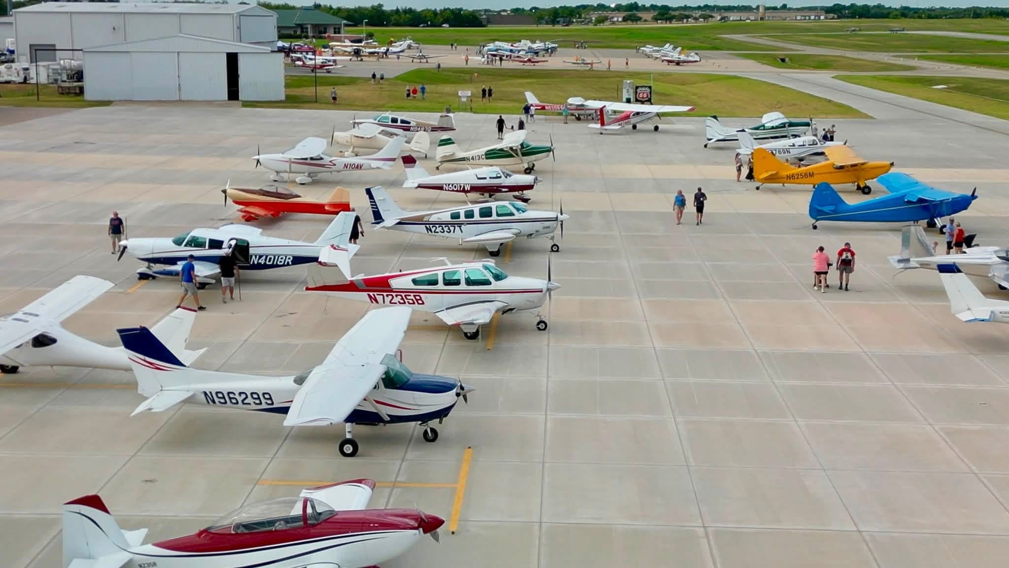 A large turnout of aircraft and visitors at an Airplanes and Coffee fly-in