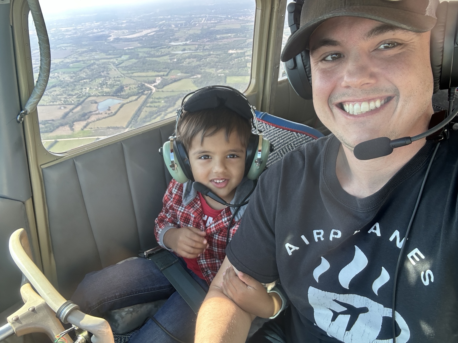 John Naugle taking his son on his first flight in the same 1960 Cessna 172A that gave John his first flight