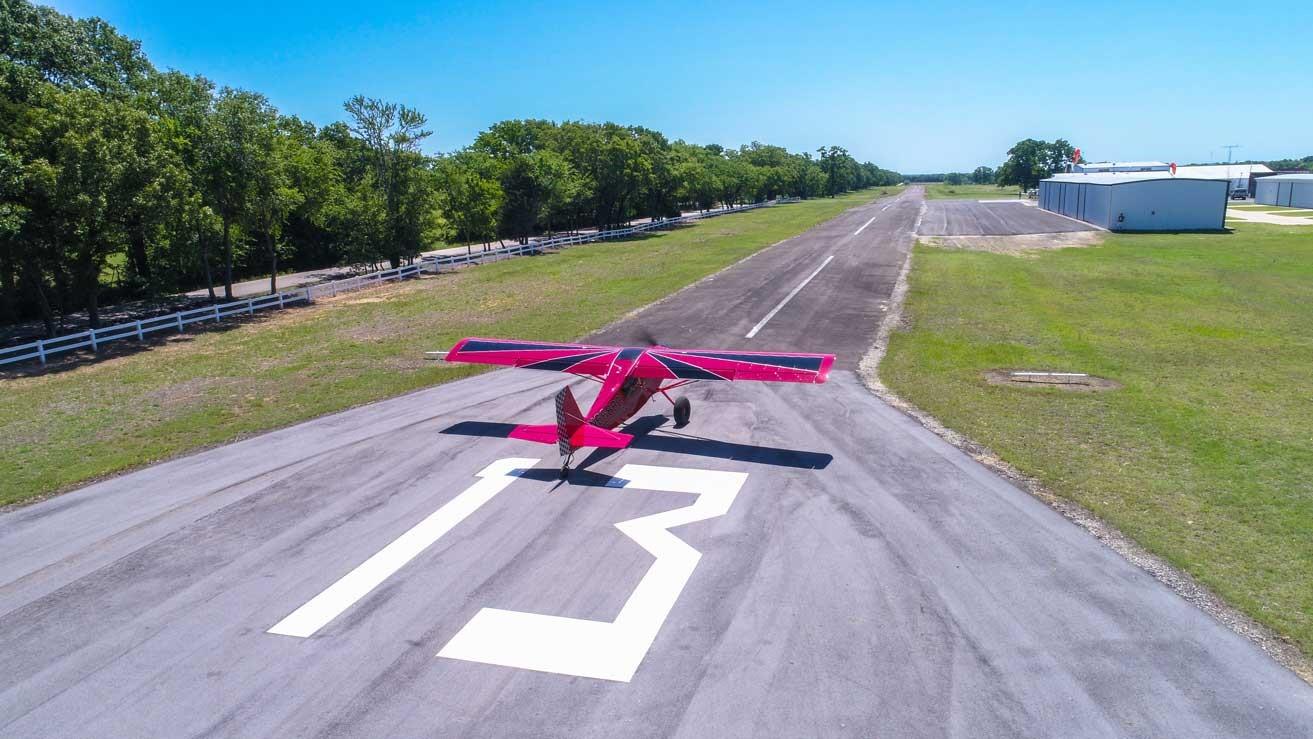 Aircraft positioned on runway 13 at Tailwind Airpark